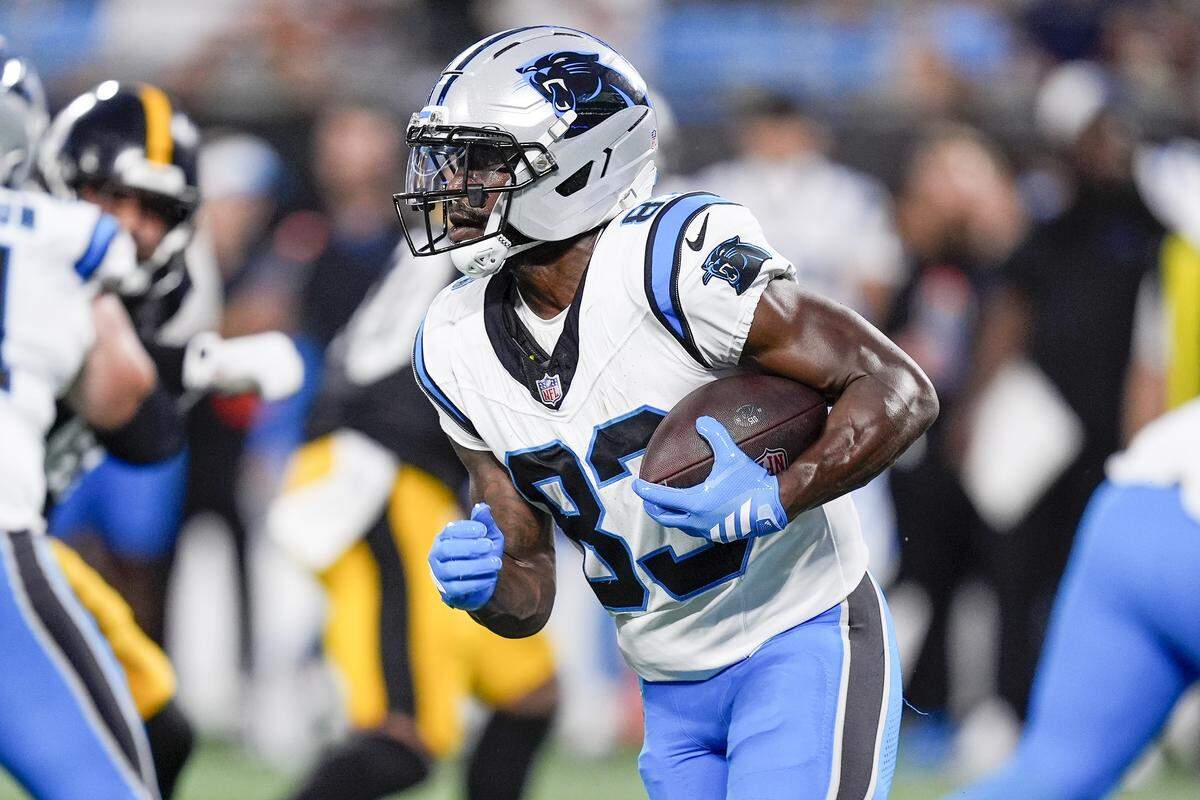 Carolina Panthers wide receiver David Moore (83) runs for yards after catch against the Pittsburgh Steelers during a mid-August preseason game at Bank of America Stadium. 