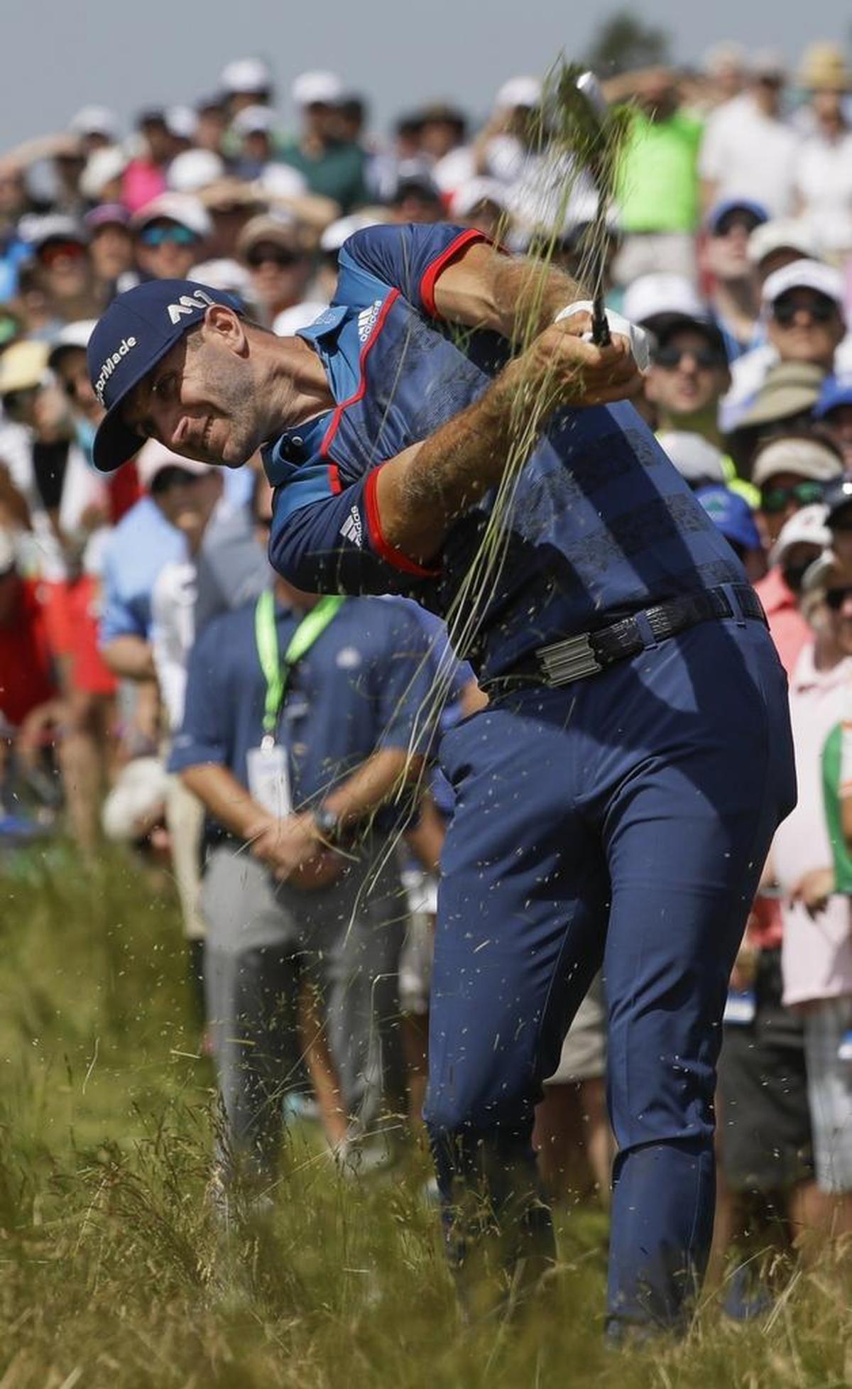 The top three ranked players in the world – Dustin Johnson, above, Rory McIlroy and Jason Day – all missed the cut Friday at the U.S. Open.