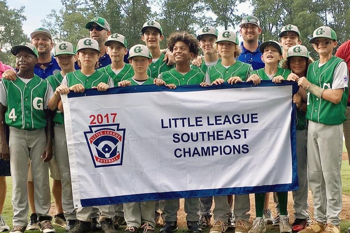 The Greenville North State All-Stars, pictured Aug. 9 after winning the Little League Southeast Regional: (front row, from left) Cash Daniels-Moye, Joesph Bryne, Jacob Caulder, Bryce Jackson, Cameron Greenway, Drew Fields, Ashton Byars and Chase Anderson; and (back row, from left) coach Mike Vaughn, Luke Lambert, manager Brian Fields, Will Casey, Matthew Matthijs, Carson Hardee, coach Jake Allen and Thomas Barrett.