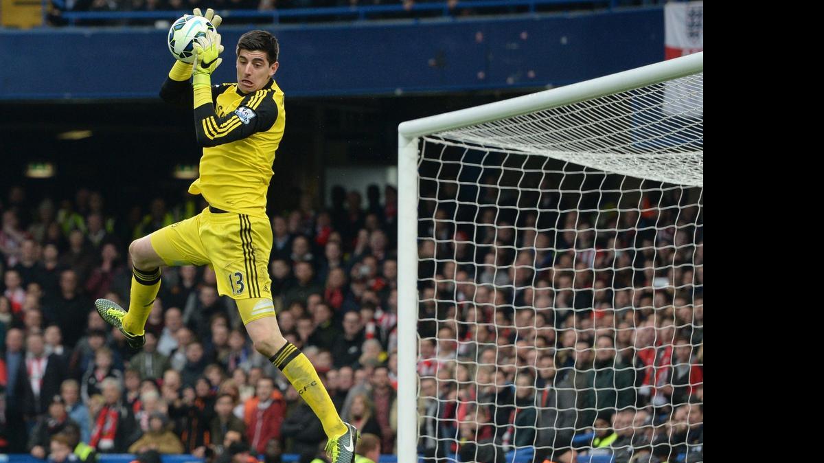 
Chelsea's Belgian goalkeeper Thibaut Courtois saves a shot during the English Premier League football match between Chelsea and Southampton at Stamford Bridge in London on March 15, 2015. Courtois and Chelsea will face Paris Saint-Germain at Bank of America Stadium Saturday.
