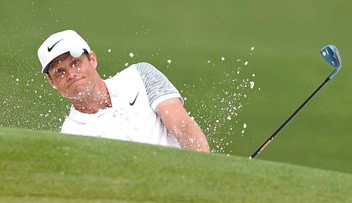 Nick Watney blasts a shot from the greenside bunker at No. 15 on Saturday during the third round of the Wells Fargo Championship at Quail Hollow. Watney enters Sunday’s final round second in the field at 8 under, two shots behind leader Jason Day.