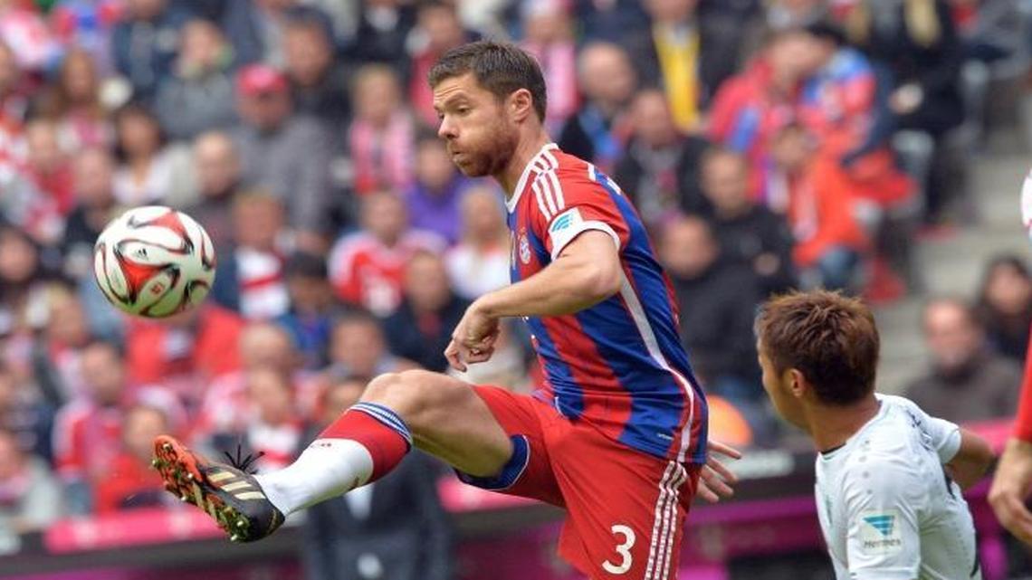 Xabi Alonso (left) and Bayern Munich will play Inter Milan in an international soccer friendly next Saturday at Charlotte’s Bank of America Stadium.