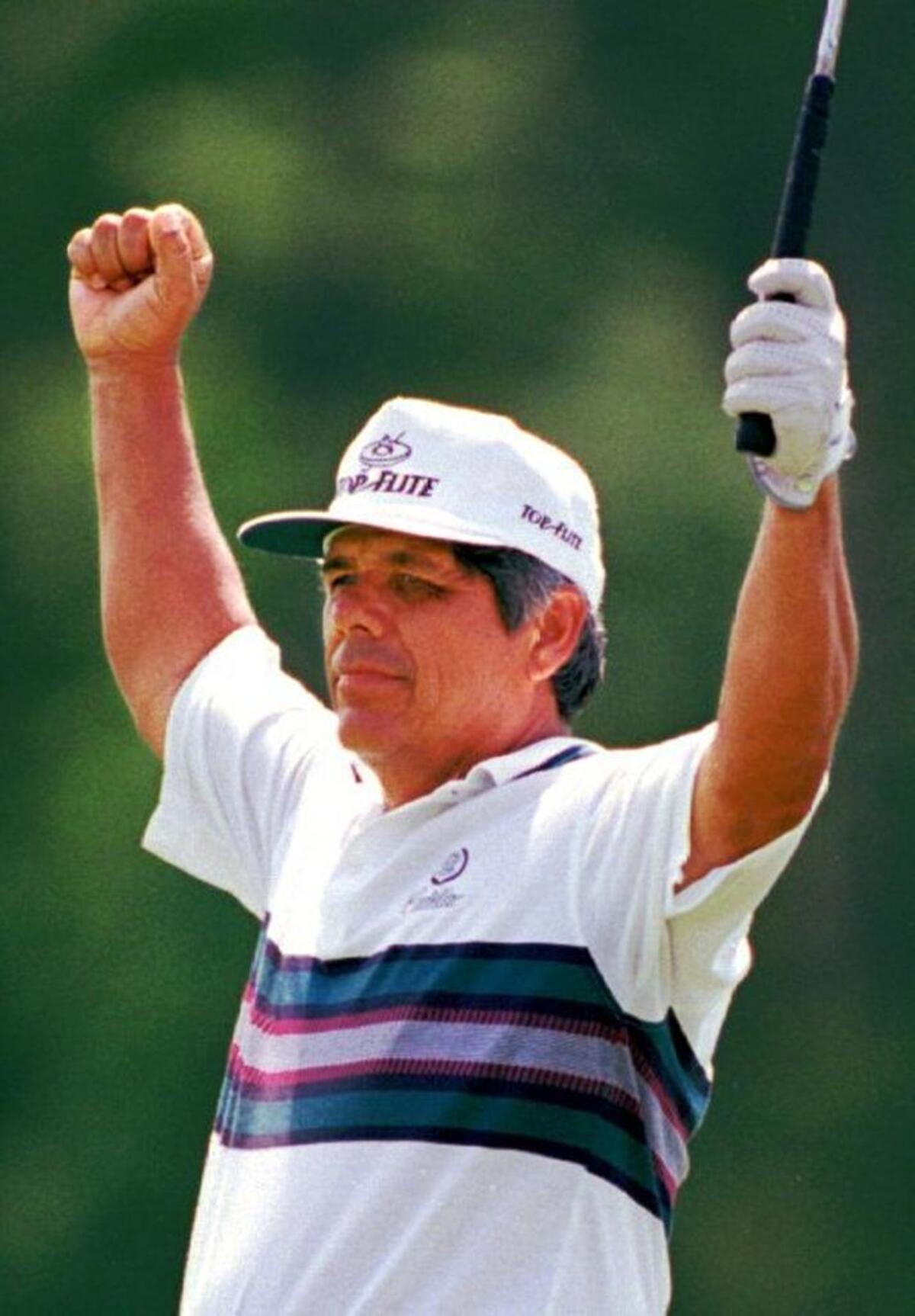 Lee Trevino reacts after he birdied the 18th hole to edge Jimmy Powell by a stroke in the Champions Tour’s PaineWebber Invitational at Charlotte’s TPC Piper Glen course in 1994. It was one of his 29 victories on the Champions Tour.