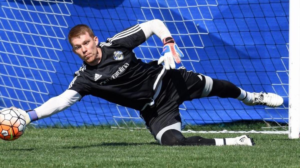 Charlotte Independence goalkeeper Kyle Renfro dives to make a stop during the team’s practice at the Ramblewood Soccer Complex stadium on Wednesday. The Independence, who missed out on making the United Soccer League (USL) playoffs last season, open their 2016 season on Saturday at home against Louisville City FC.