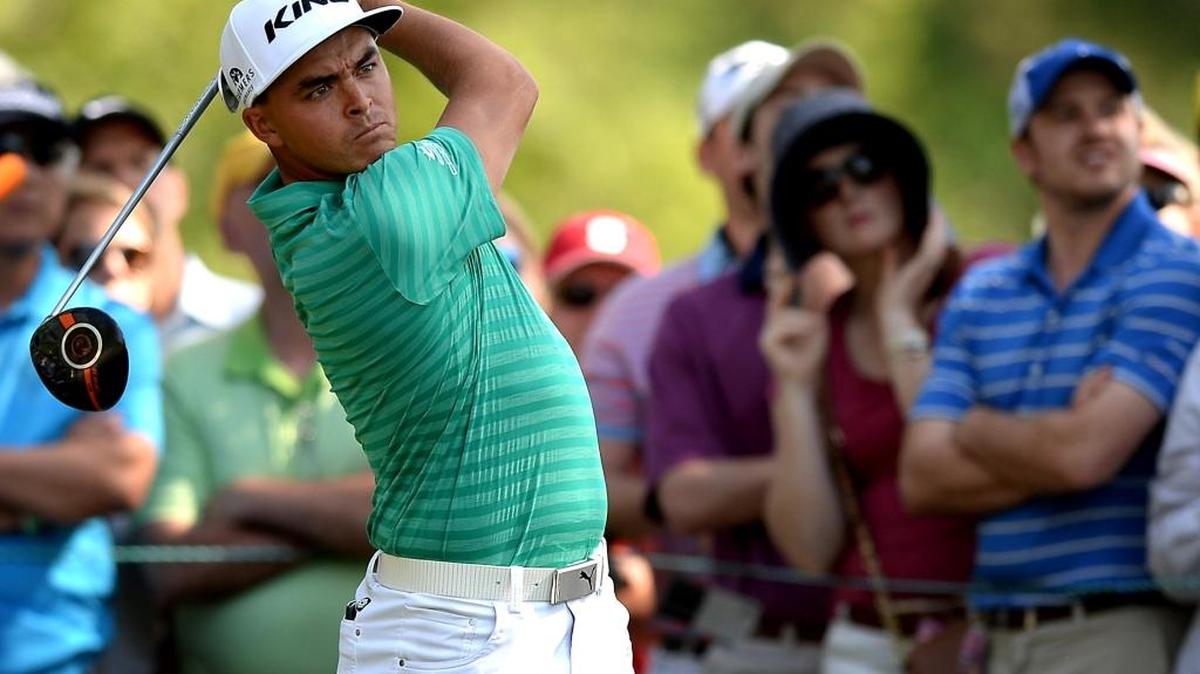 Rickie Fowler watches his drive from the 15th tee box during third-round action of the Wells Fargo Championship at Quail Hollow Club in Charlotte. Fowler finished Saturday’s round in first place at -9.
