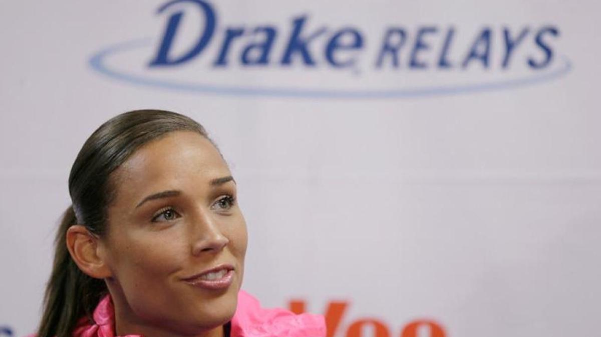 U.S. Olympic hurdler and bobsledder Lolo Jones speaks during a news conference at the Drake Relays athletics meet in April 2014 in Des Moines, Iowa.