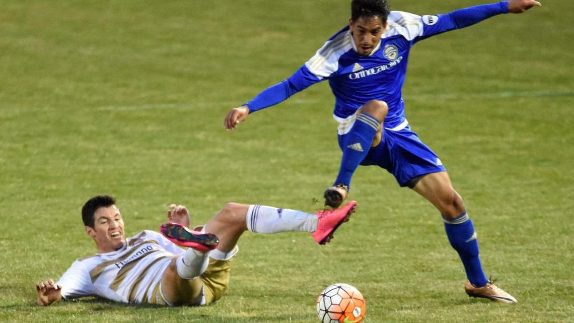 Charlotte Independence midfielder David Estrada, right, and Louisville City FC midfielder Kyle Smith battle for control of the ball during the first half of their United Soccer League match on Saturday, March 26, 2016, at the Ramblewood Soccer Complex stadium in Charlotte.