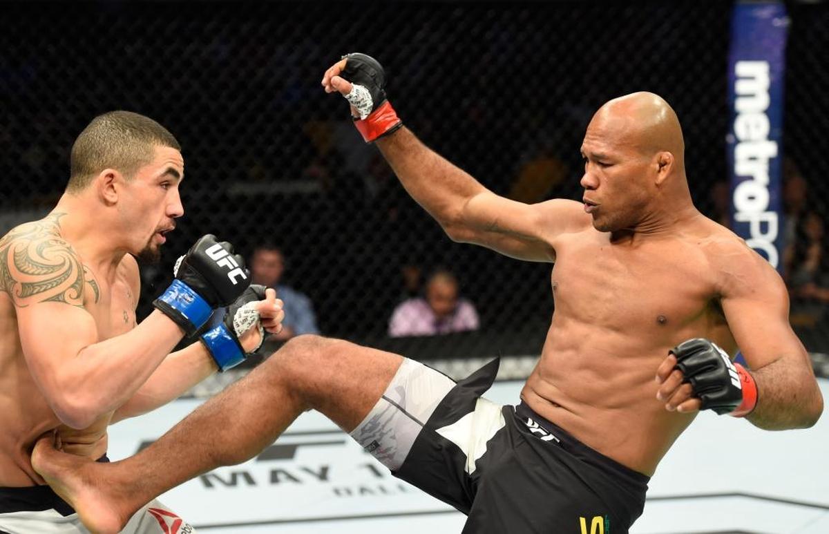 Jacare Souza of Brazil kicks Robert Whittaker of New Zealand in their middleweight fight during the UFC Fight Night event at Sprint Center on April 15, 2017, in Kansas City, Mo.
