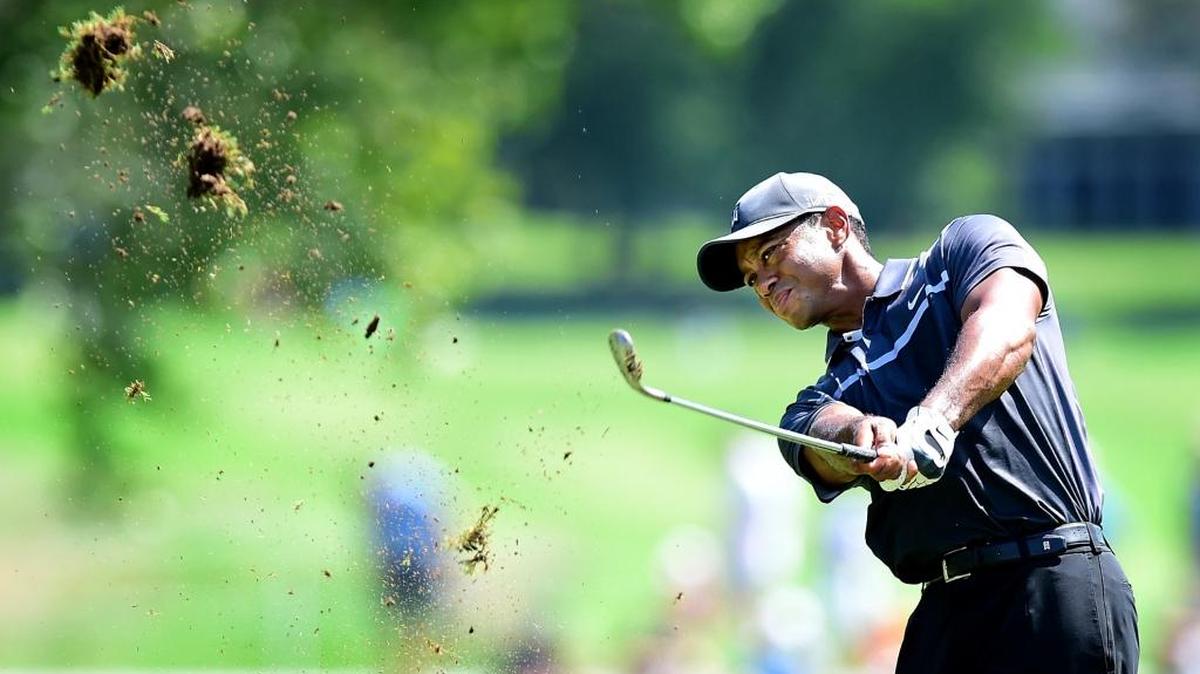 
Tiger Woods plays his second shot on the eighth hole during the second round of the Wyndham Championship at Sedgefield Country Club on August 21, 2015 in Greensboro, North Carolina. 
