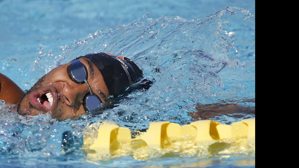 
Olympian Cullen Jones warms up prior to his race, Thursday, April 16, 2015, at the Arena Pro Swim Series in Mesa, Ariz.
