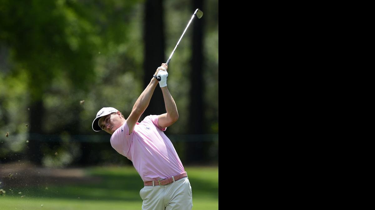 
Justin Thomas follows through on his second shot from the ninth fairway during third-round action on Saturday.


