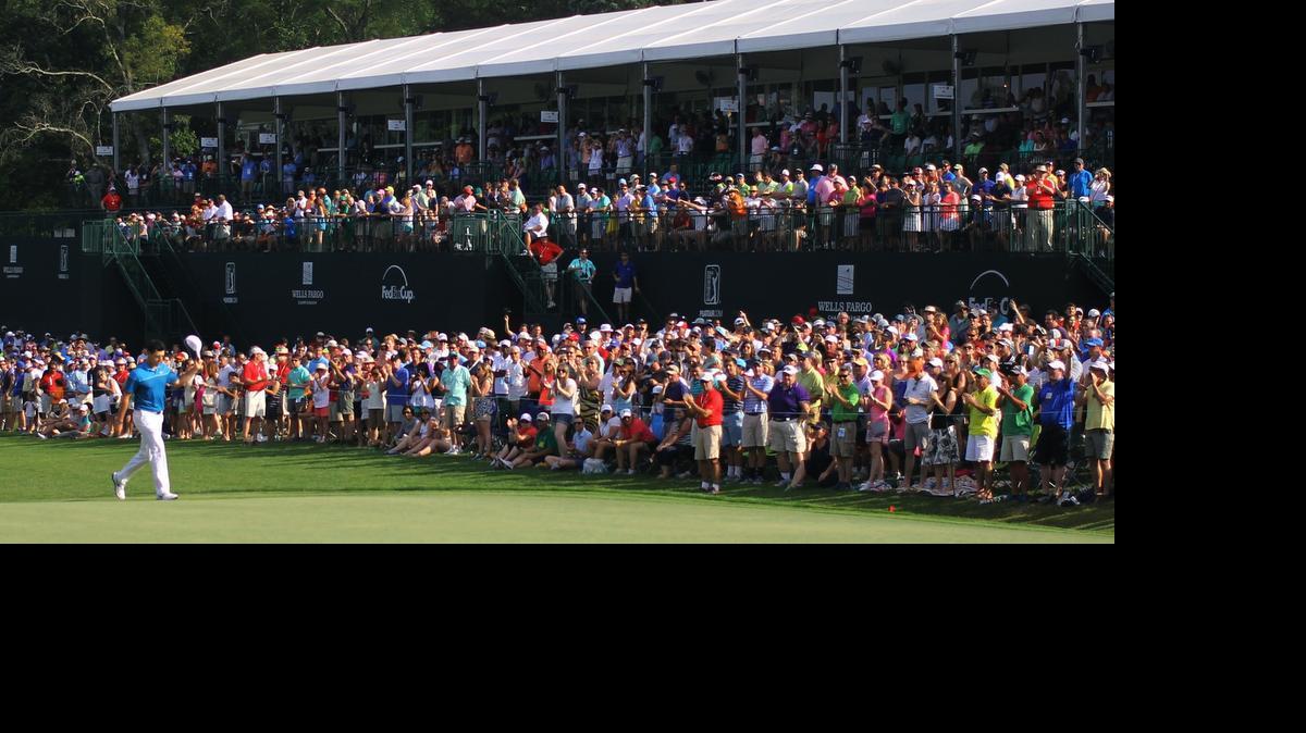 
Rory McIlroy is greeted by a standing ovation before playing the 18th hole during the final round of the Wells Fargo Championship at the Quail Hollow Club on Sunday, May 17, 2015.
