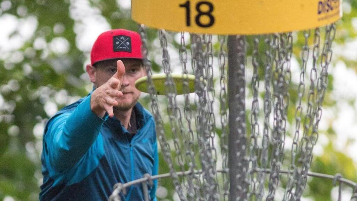 Jeremy Koling of Charlotte was declared winner of United States Disc Golf Championship when round four was canceled due to the impact of Hurricane Matthew. Koling makes his birdie putt on hole No. 18 during round 3 Friday, Oct. 7, 2016 at Winthrop University disc golf course in Rock Hill.
