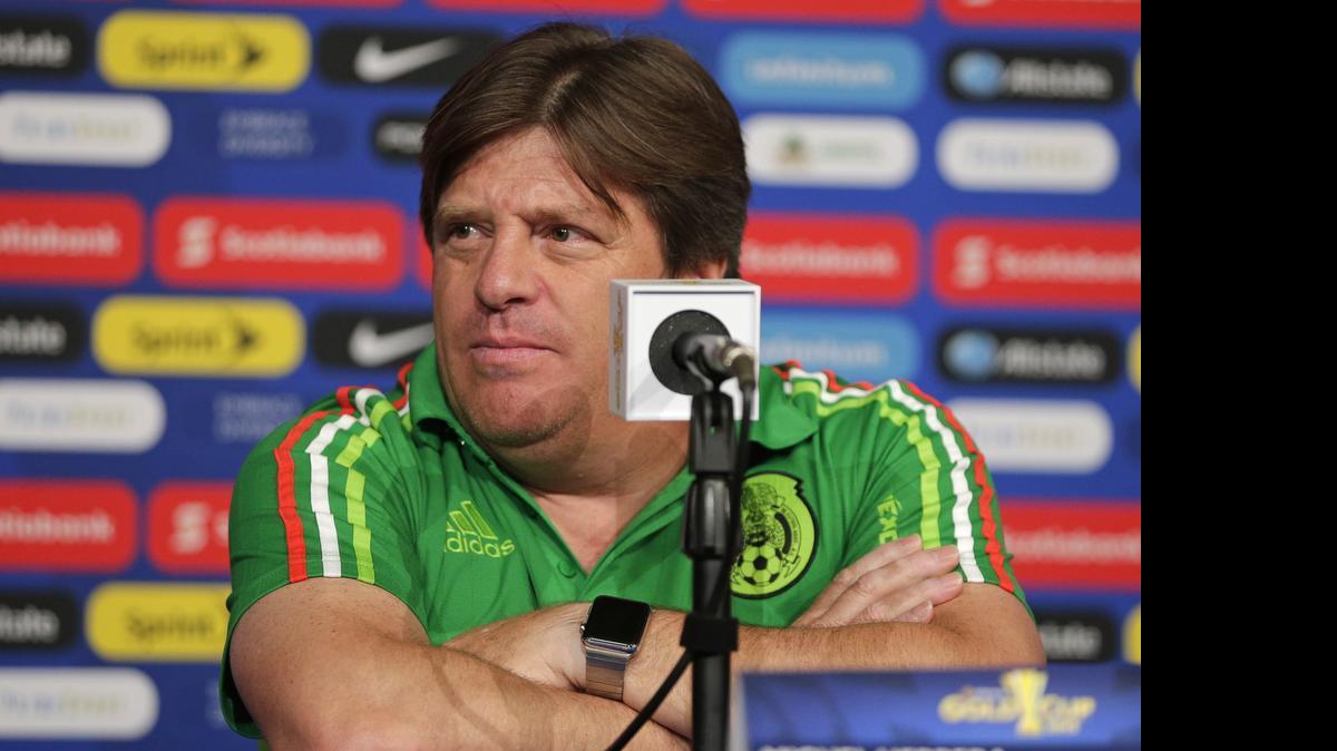 
Mexico head coach Miguel Herrera listens to a question during a news conference in advance of a CONCACAF Gold Cup soccer match in Charlotte Tuesday, July 14, 2015. Mexico plays Trinidad & Tobago on Wednesday. 
