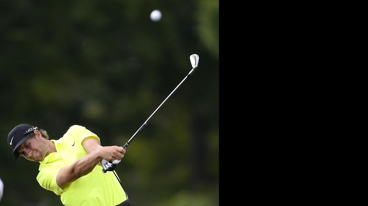 
Patrick Rodgers hits his second shot to the 16th green during the Wells Fargo Championship on Sunday, May 17, 2015 at Quail Hollow Club in Charlotte. Rodgers finished the round at -14.
