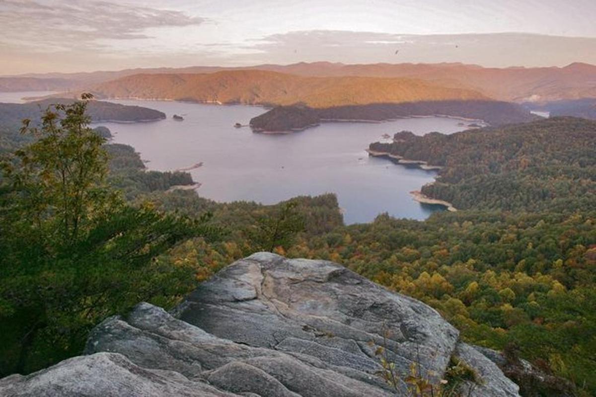 The undeveloped wilderness of 43,500 acres surround Lake Jocassee, called Jim Timmerman Natural Resources Area at Jocassee Gorges, is managed by the S.C. Dept of Natural Resources. The is the view of the lake from atop Jumping Off Rock.