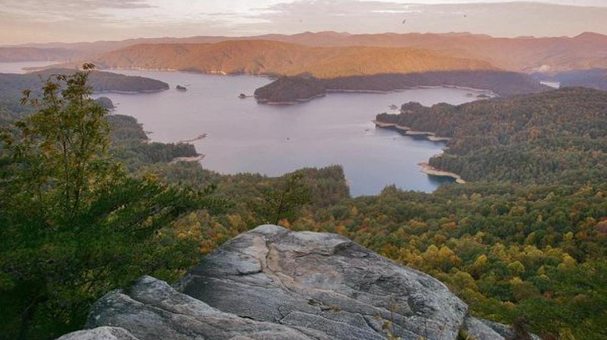 The undeveloped wilderness of 43,500 acres surround Lake Jocassee, called Jim Timmerman Natural Resources Area at Jocassee Gorges, is managed by the S.C. Dept of Natural Resources. The is the view of the lake from atop Jumping Off Rock.
