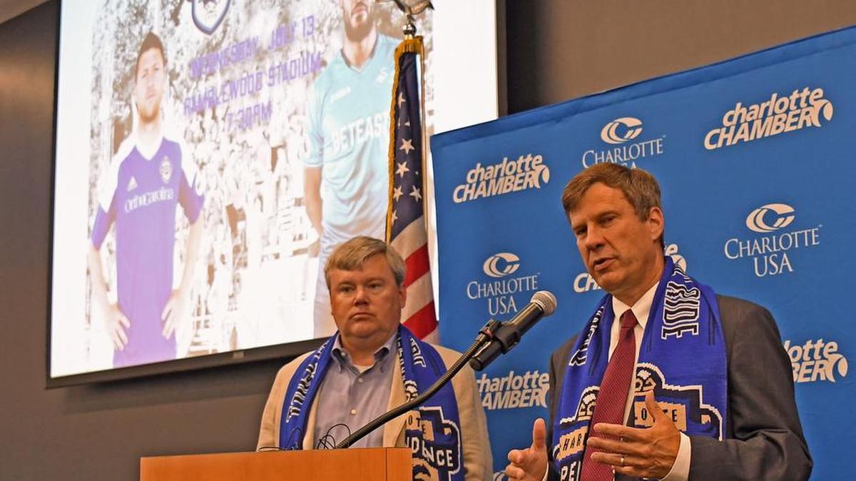 Jim McPhilliamy (left), president of the Charlotte Independence, and team general manager Tom Engstrom (right), answer questions during a press conference Tuesday, June 7, 2016, at the Charlotte Chamber announcing that the United Soccer League team would host English Premier League club Swansea City in an exhibition on Wednesday, July 13, 2016, at Ramblewood Soccer Complex Stadium.