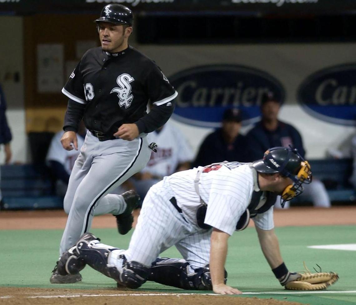 Former Charlotte Knights standout Brian Baubach (left) played with the Chicago White Sox in 2003. On Thursday, he will be inducted into the Charlotte Baseball Round Table of Honor.
