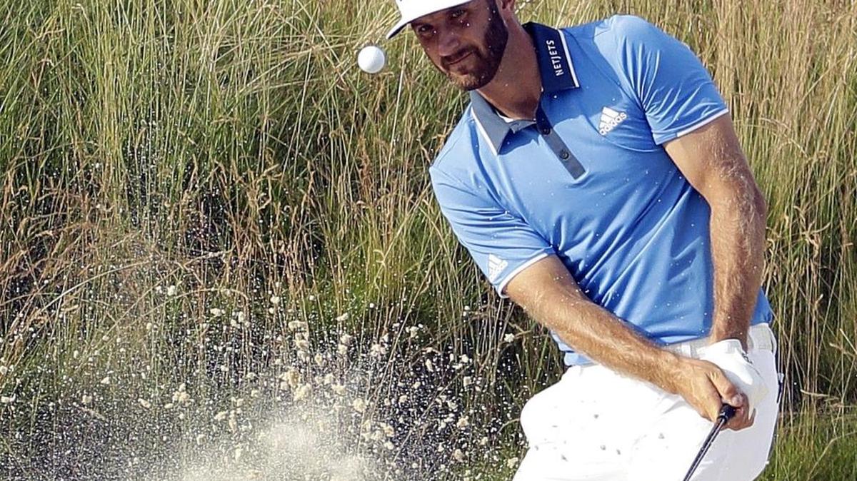 Dustin Johnson hits out of the bunker on the fifth hole during the third round of the U.S. Open golf championship at Oakmont Country Club on Saturday in Oakmont, Pa. Johnson is chasing his first major championship after coming close on several occasions.