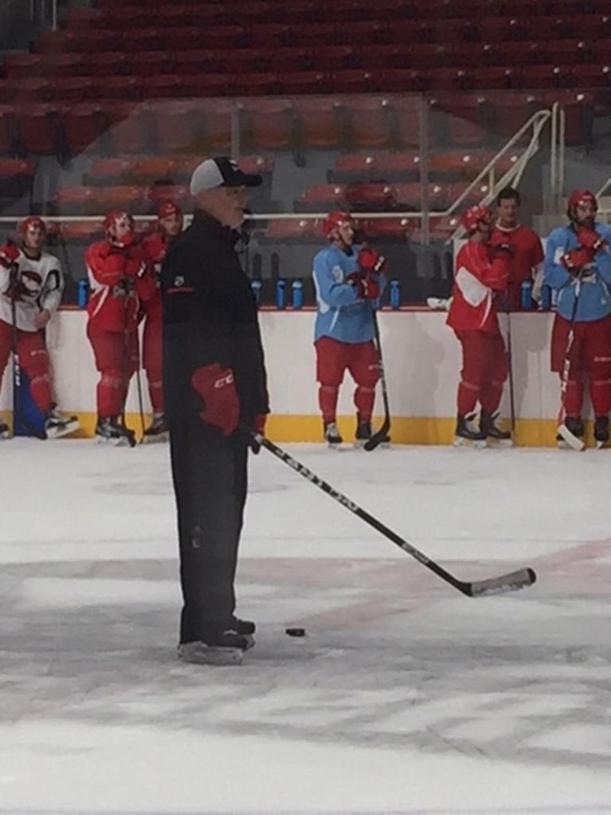 New Charlotte Checkers coach Mike Vellucci addresses his squad at Wednesday’s practice at Bojangles Coliseum. The Checkers have their top seven scorers back from last season, have added several high-scoring young players and have a goalkeeping tandem that is highly regarded by scouts.