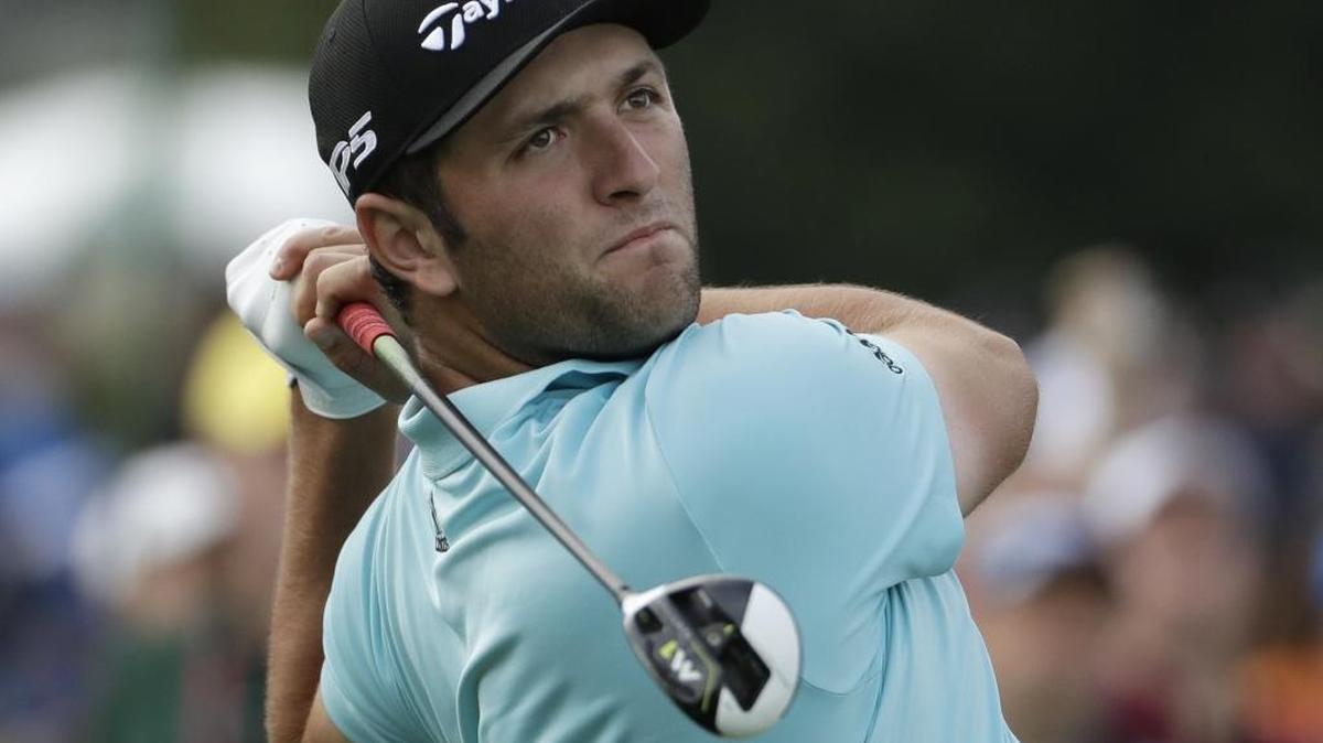 Spain’s Jon Rahm hits a drive on the first hole during Wednesday’s practice round at Augusta National, site of this week’s Masters tournament.