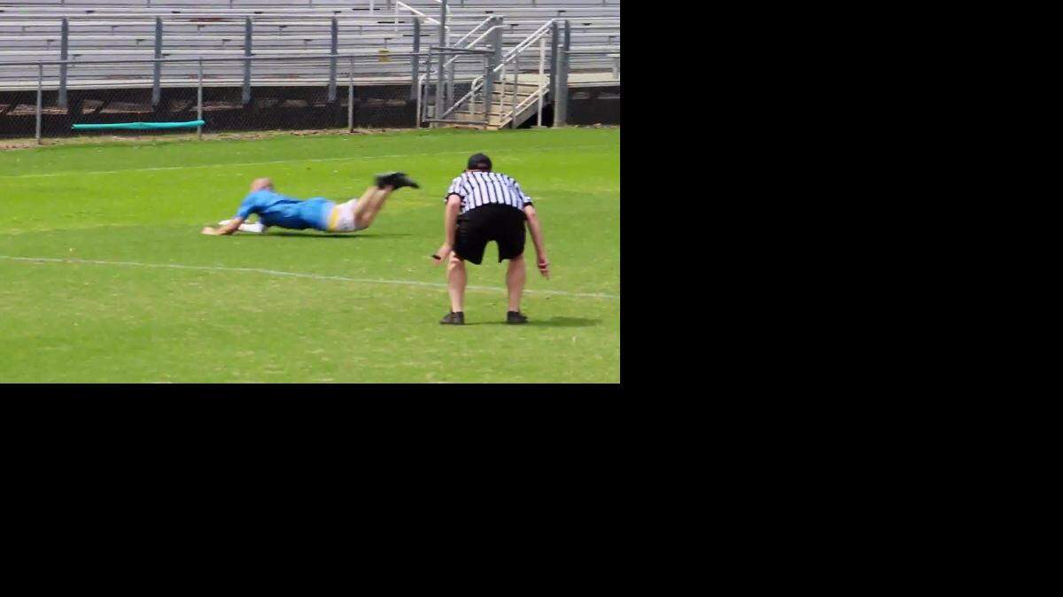 
The Charlotte Express’ Micah Hood dives during a American Ultimate Disc League game against the Atlanta Hustle at East Mecklenburg High School.
