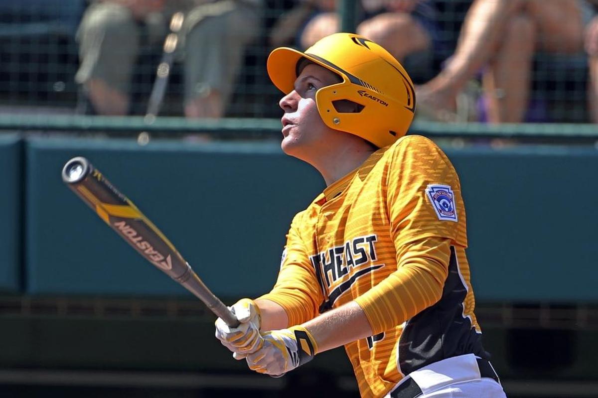 Greenville, N.C.'s Carson Hardee watches his grand slam clear the centerfield fence in the second inning of Sunday’s game against California. North Carolina won 16-0.