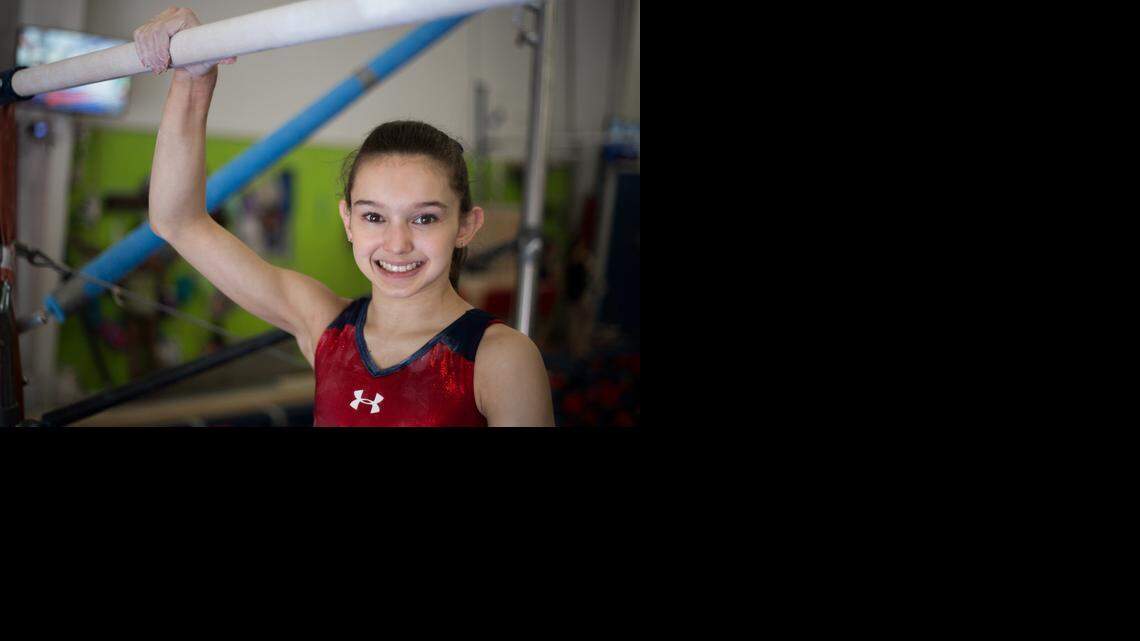 
Emily Schild takes a break during a practice session at Everest Gymnastics in Huntersville.

