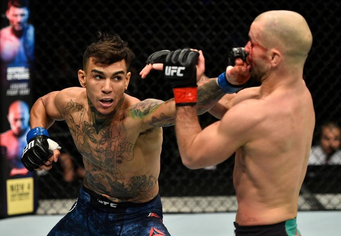 Andre Fili punches Artem Lobov of Russia in their featherweight bout during the UFC Fight Night event inside Ergo Arena on Oct. 21 in Gdansk, Poland.