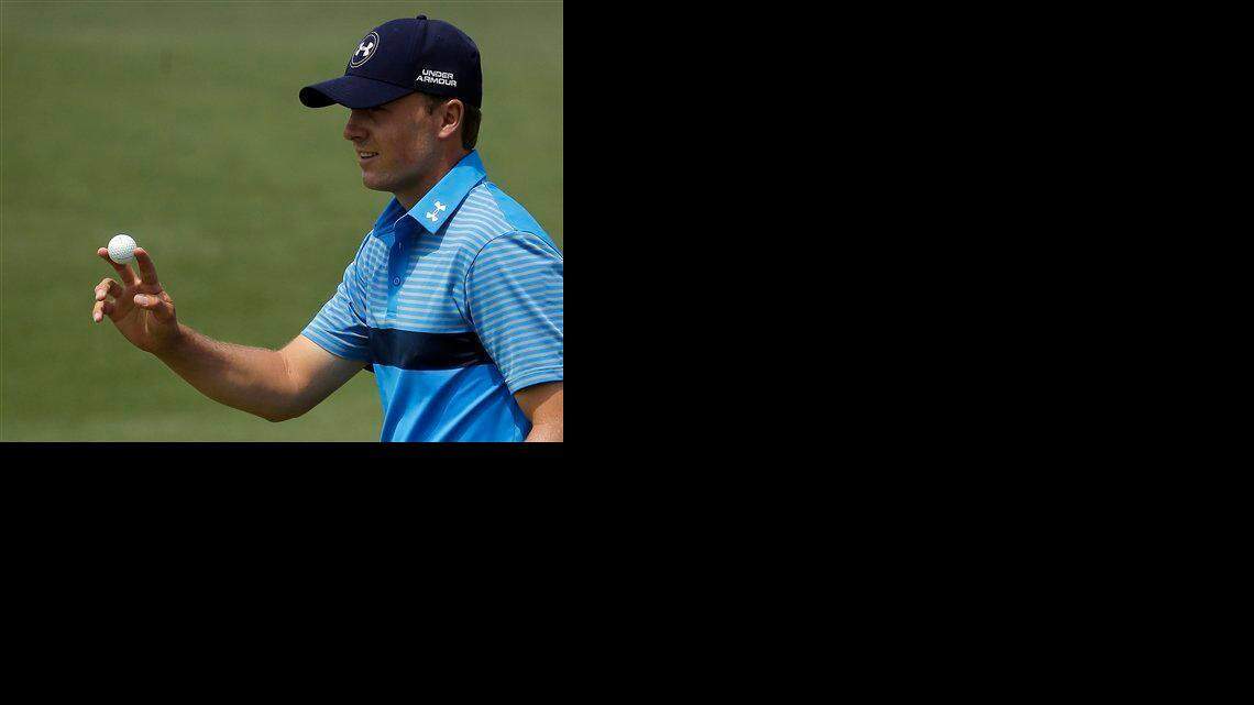 Jordan Spieth holds up his ball a birdie on the second hole during the first round of the Masters golf tournament Thursday, April 9, 2015, in Augusta, Ga.