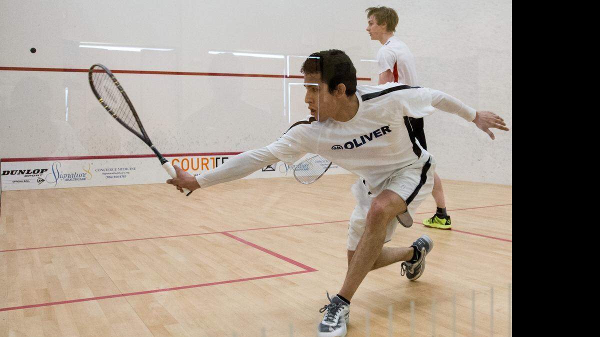 
Fransisco Mendez Correa stretches out for the hit at the Charlotte Open squash tournament at the Charlotte Squash Club in Charlotte,  Thursday, April 23, 2015.
