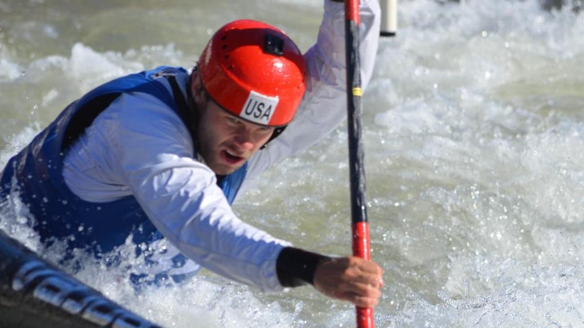 Stroking for the finish line, canoeist Casey Eichfeld of Mount Holly pulls away from a slalom gate Saturday during the final day of U.S. Olympic team trials at the U.S. National Whitewater Center.