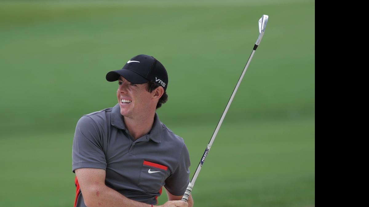 
2010 Wells Fargo Championship winner Rory McIlroy hits a ball out of a sand trap at the Wells Fargo Championship Pro-Am on April 30, 2014. McIlroy, the top-ranked golfer in the world, is one of eight top-20 players who will be in Charlotte this week.

