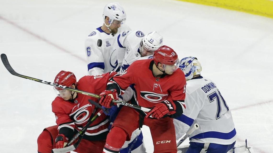 The Carolina Hurricanes sent Valentin Zykov, left front, and Nicolas Roy, right, to the Charlotte Checkers this week. The Checkers have clinched a spot in the Calder Cup playoffs.