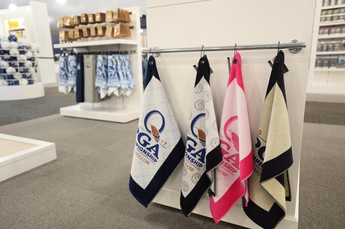 PGA towels, a best-selling item at The Championship Shops, a new merchandise tent area at Quail Hollow Club for the PGA Championship. The towels are printed by local company Devant Sport Towels.