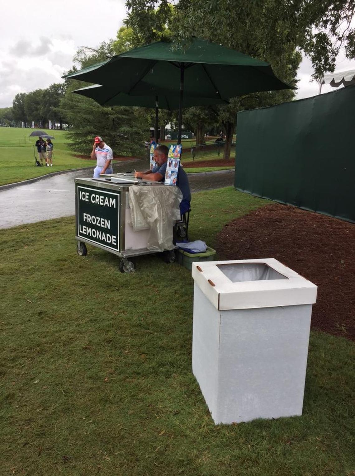 Green trash bags and white trash receptacles line the pathways around the course, but there aren’t any designated places for recycling.