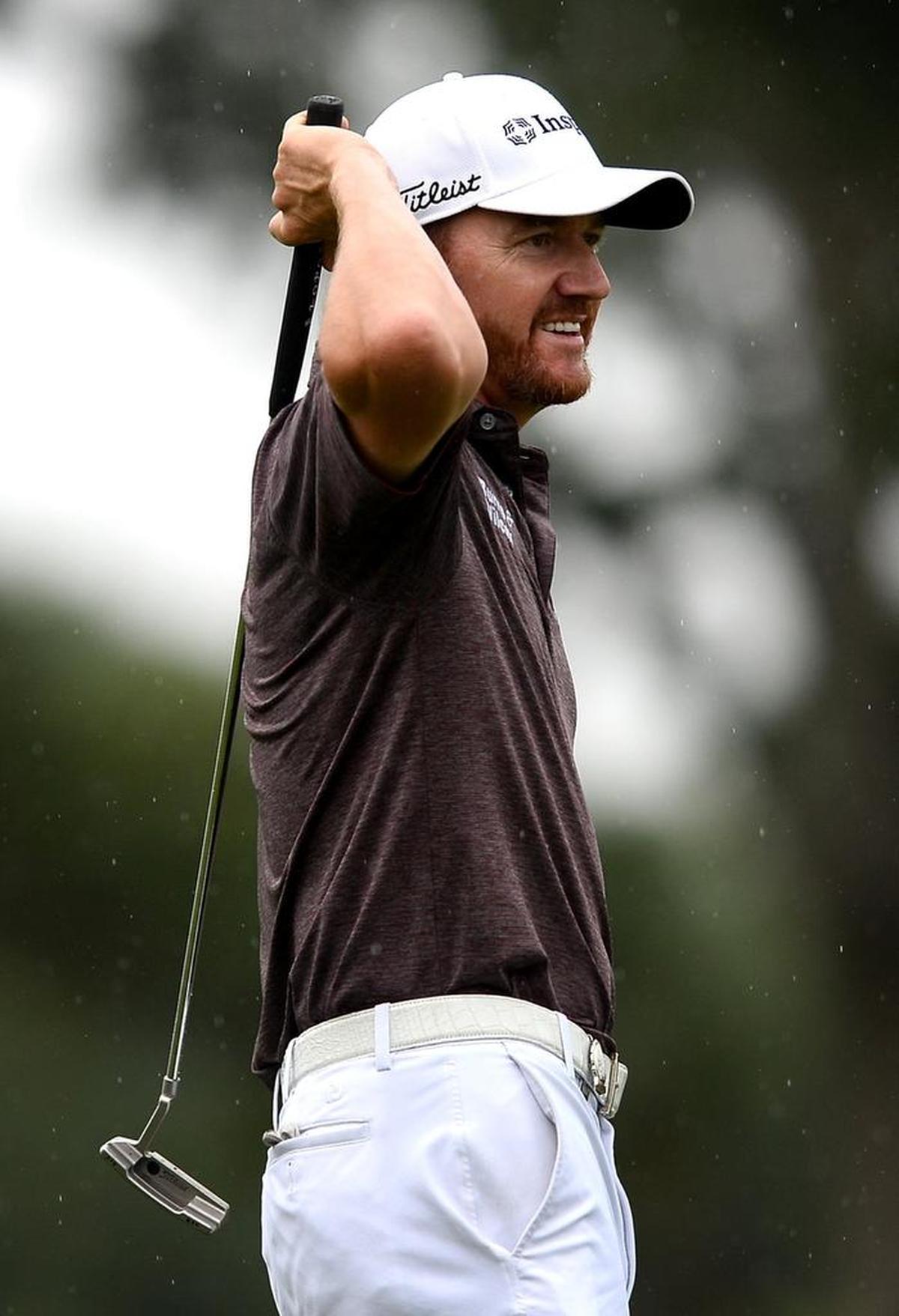 Jimmy Walker chats with fans near the 17th tee during Tuesday’s practice round at Quail Hollow Club.