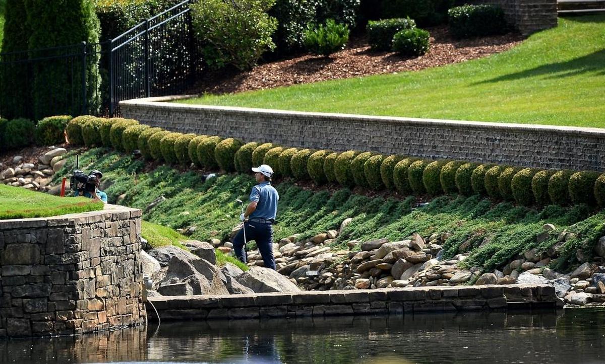 Kevin Kisner looks toward the green prior to hitting his third shot along the seventh fairway during Saturday’s third round of the PGA Championship at Quail Hollow Club in Charlotte.