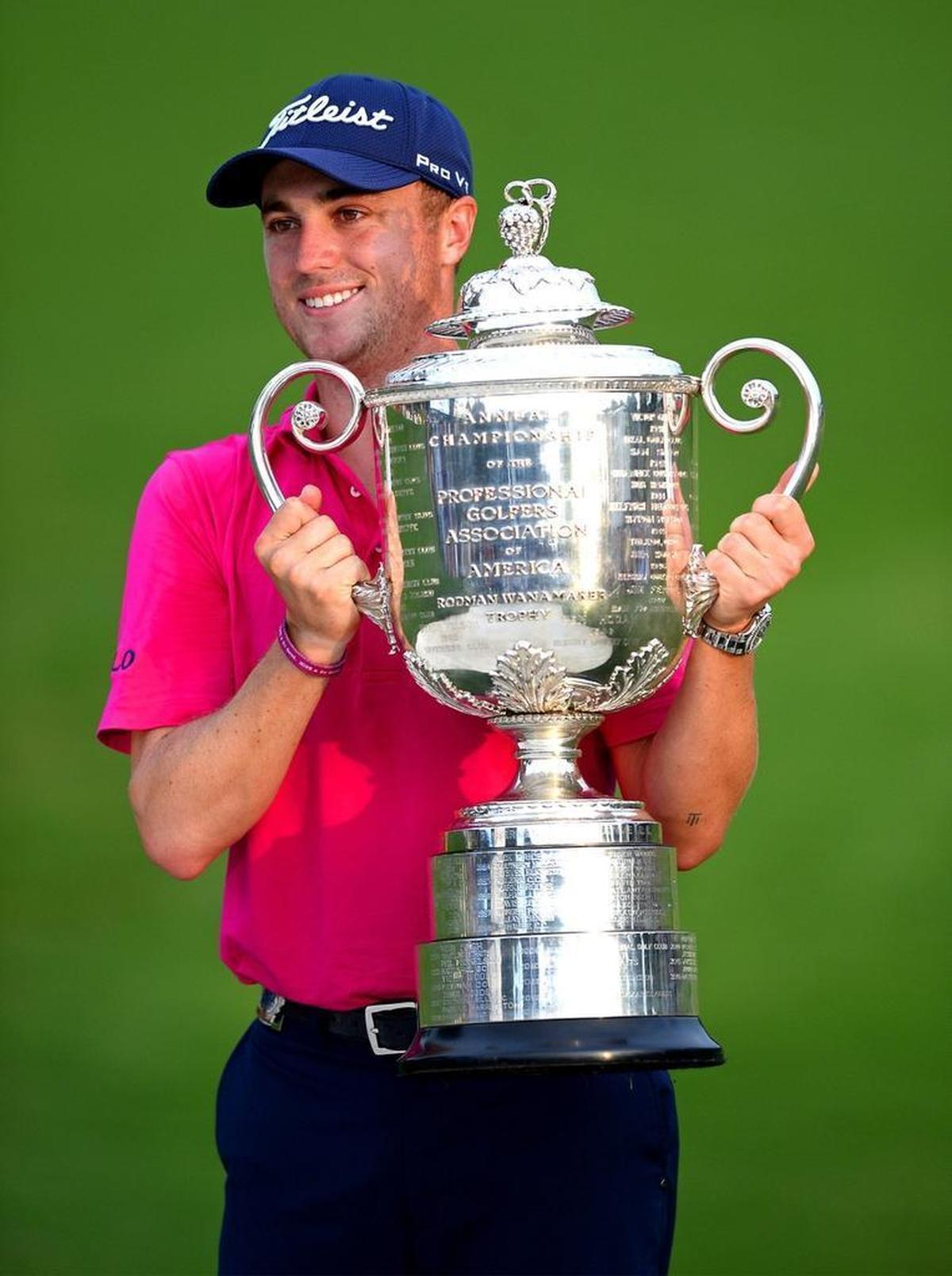Justin Thomas poses with the Wanamaker Trophy following Sunday’s final round in the PGA Championship at Quail Hollow Club in Charlotte in 2017.