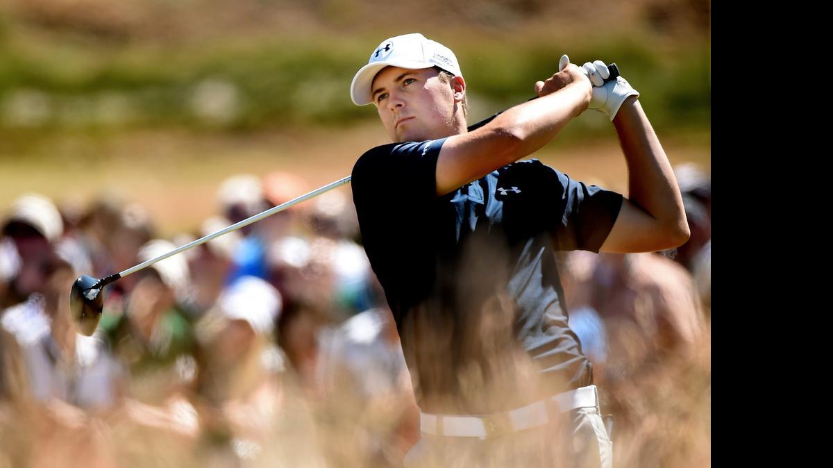 
Jordan Spieth hits his tee shot on the first hole during the second round of the 115th U.S. Open Championship at Chambers Bay on June 19, 2015 in University Place, Wa. 
