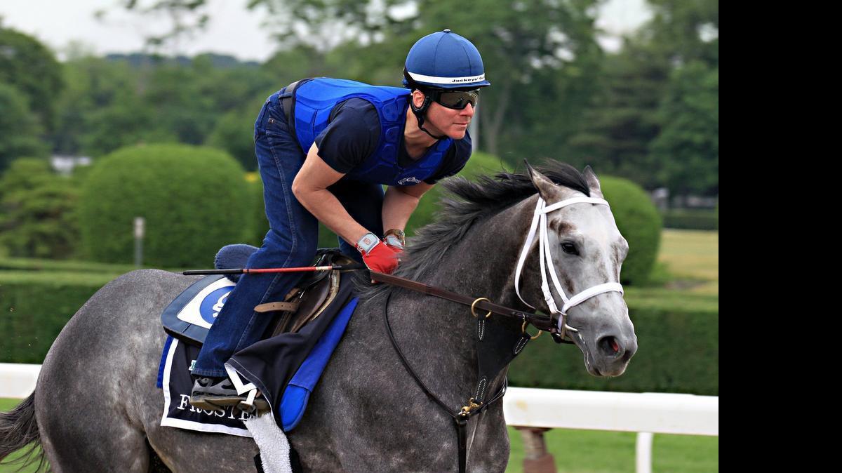 
Exercise rider Lorenzo Moralez gallops Belmont Stakes entrant Frosted at Belmont Park race track in Elmont, NY, Thursday, June 4, 2015.

