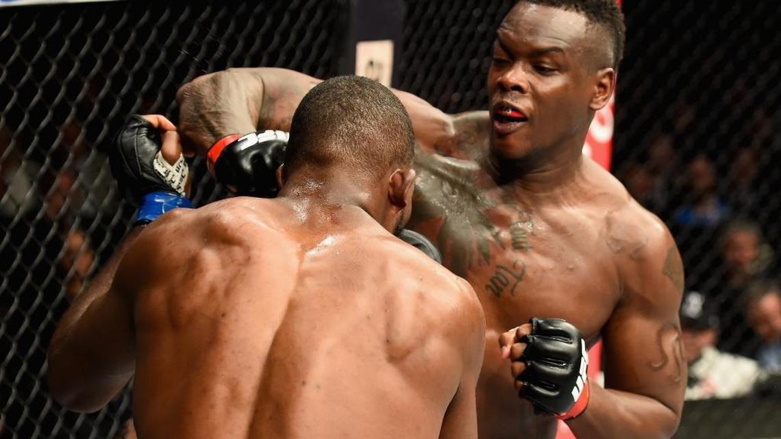 Ovince Saint Preux lands a punch against Corey Anderson in their light heavyweight bout during the UFC 217 event at Madison Square Garden on Nov. 4 in New York City.