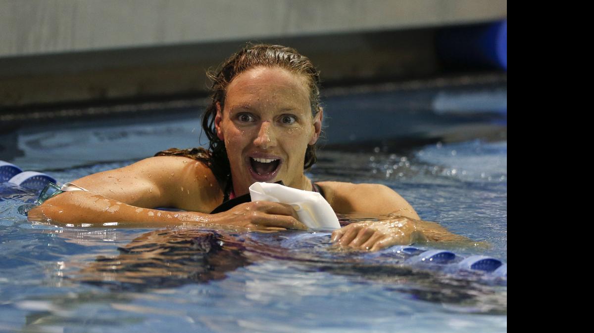
Katinka Hosszu, of Hungary, reacts after winning the 200-meter backstroke at the Arena Pro Swim Series meet in Charlotte, Sunday, May 17, 2015.
