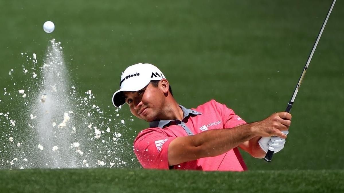 Australian Jason Day blasts a shot from the sand along the second green during Tuesday’s practice round at Augusta National Golf Club. Day is the world’s No. 1-ranked golfer.