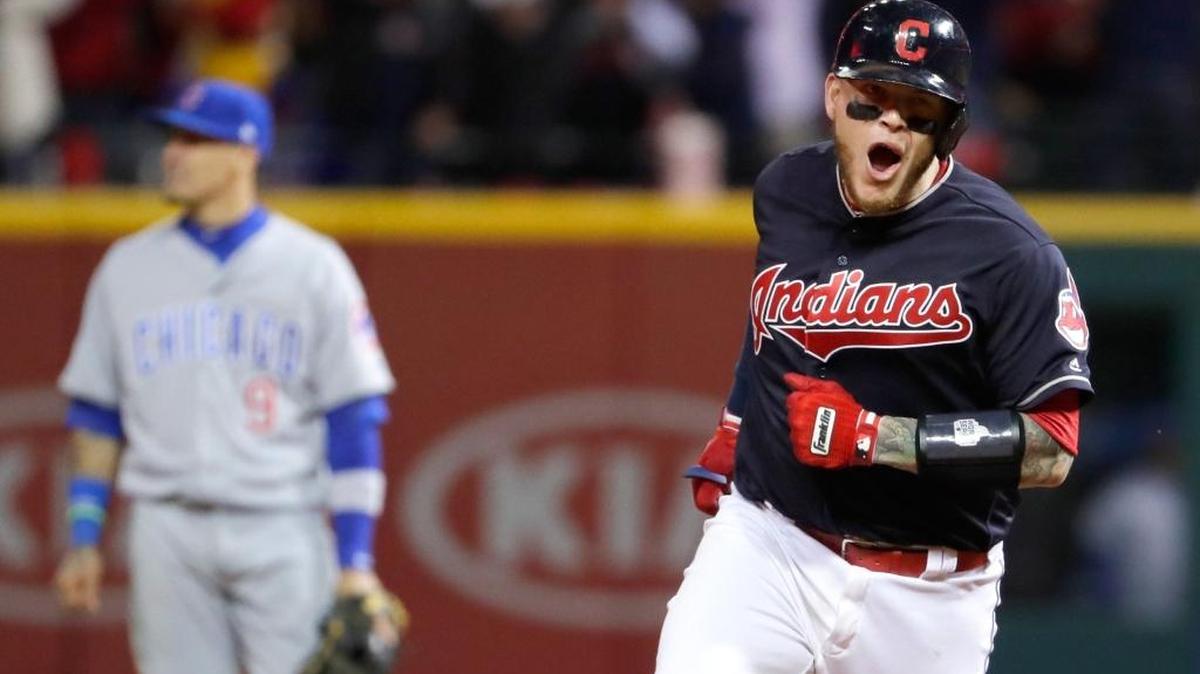 Roberto Perez of the Cleveland Indians reacts as he runs the bases after hitting a three-run home run during the eighth inning against the Chicago Cubs in Game One of the 2016 World Series.