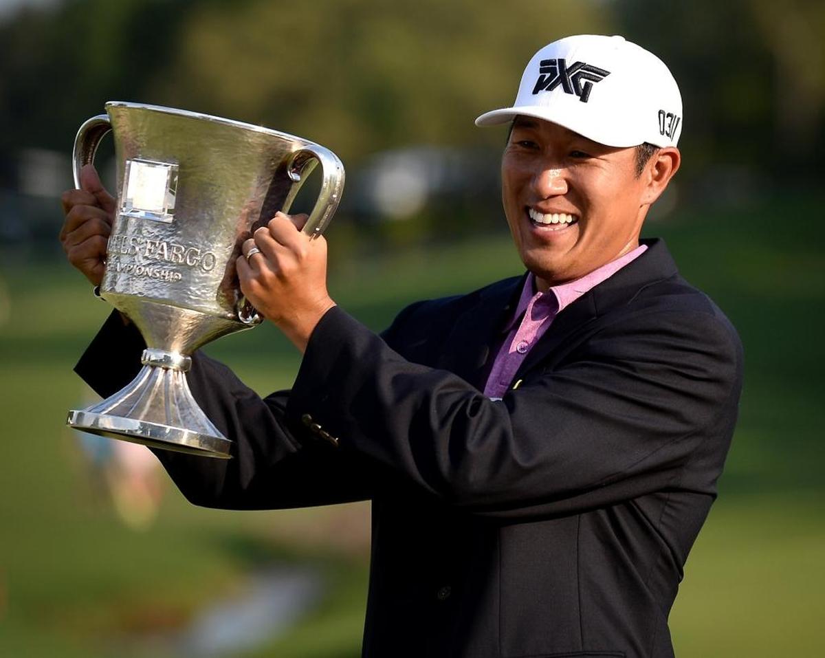James Hahn hoists the Wells Fargo Championship trophy after defeating Roberto Castro in a playoff in 2016, the last year the tournament was played in Charlotte. It moved to Wilmington in 2017.