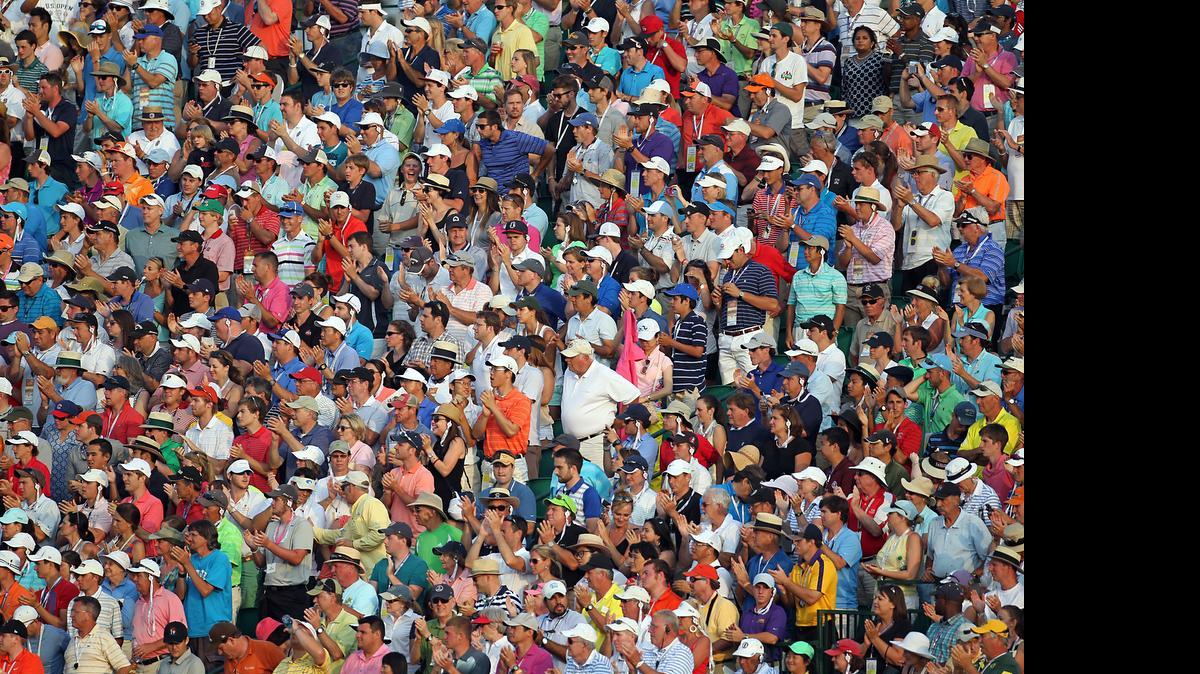 
Spectators give Martin Kaymer a rousing ovation as he approaches the 18th hole during the final round of the 2014 U.S. Open at Pinehurst No. 2. Kaymer won the tournament by an eight-stroke margin. 


