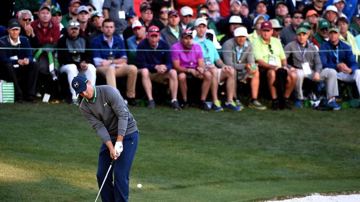Jordan Spieth chips onto the 16th green during third round action in The Masters on Saturday, April 9, 2016 at Augusta National Golf Club in Augusta, GA. Spieth leads the field at -3.