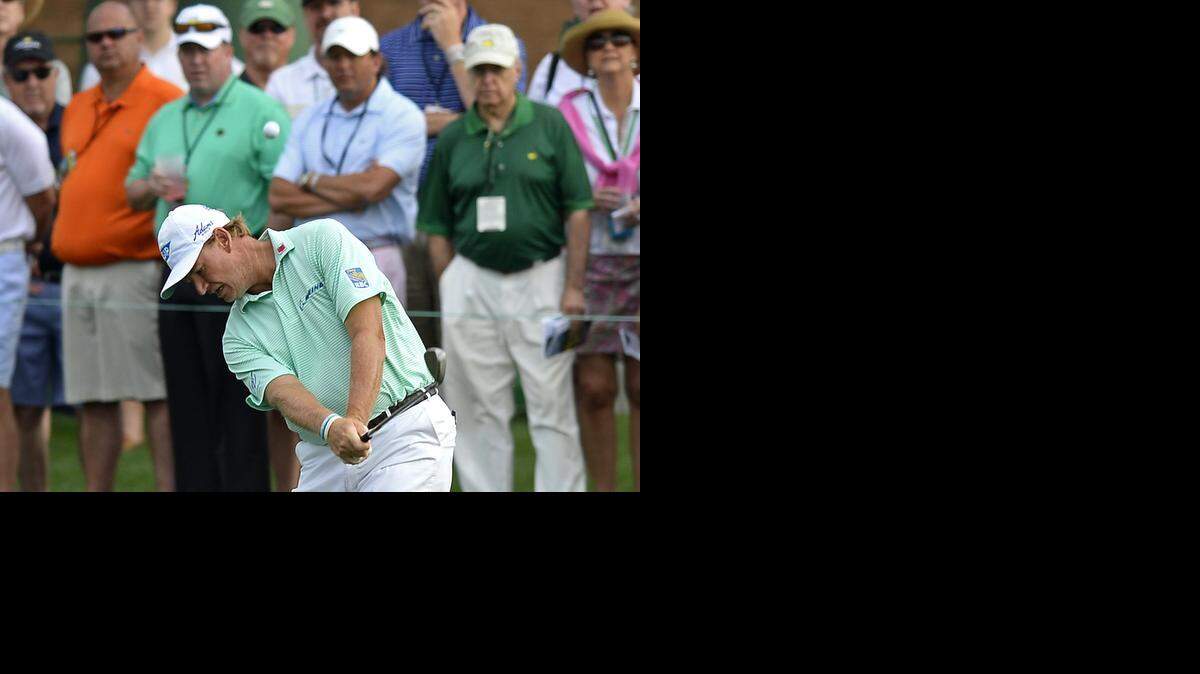 
Ernie Els chips onto the second green during Friday’s second round of the Masters tournament at Augusta National Golf Club. Els shot an even-par 72 to remain 5 under after 36 holes.
